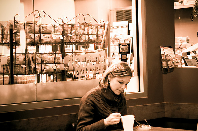 Woman eating alone