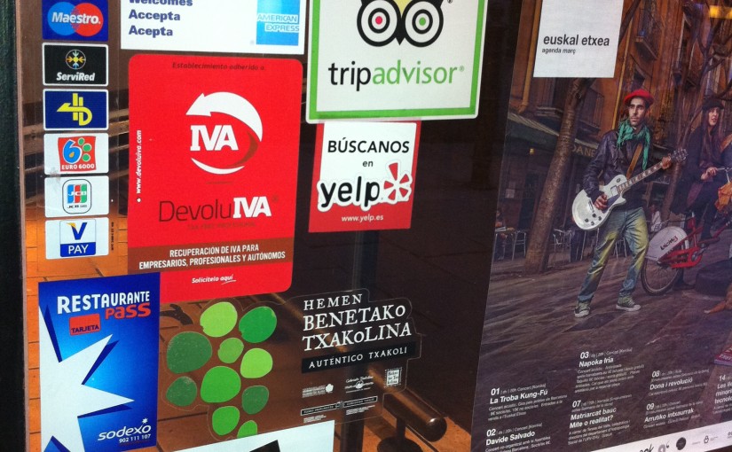 Stickers Covering a Restaurant Window in Barcelona